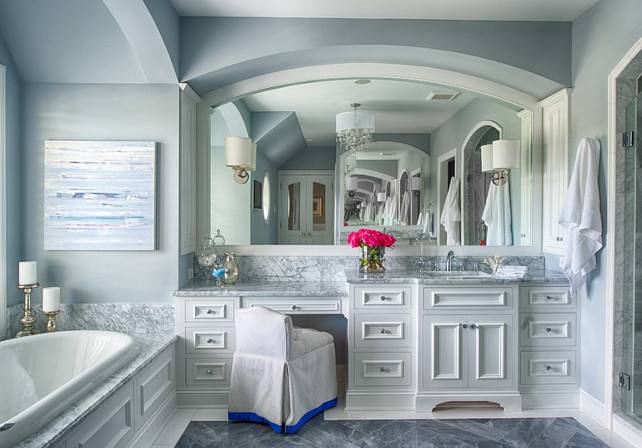 bathroom with white cabinets