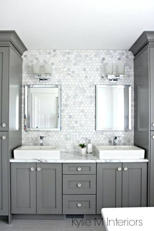 A look at the sink in the galley kitchen with a subway tile backsplash