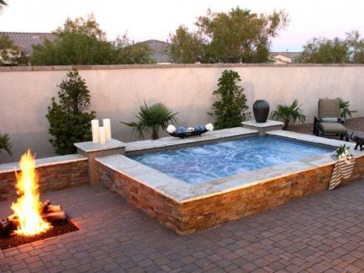 Cool off this summer in your small backyard pool [Design: Alka Pool Construction]