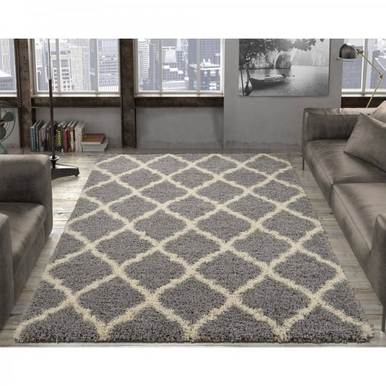 I'm also happy, I went with a larger area rug this time, the 9x12 rug fills  out our small living room nicely and basically floats in the room,