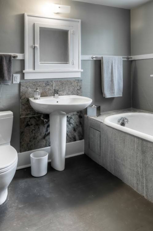 pedestal sink with backsplash small bathroom design with corner pedestal  sink and square tile also wainscoting