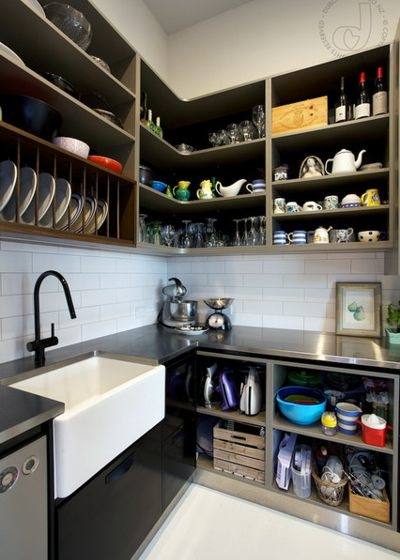 Sleek contemporary entertainers' kitchen with separate scullery and  decorative waterdrop splashback