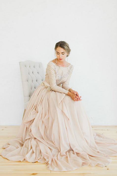 Long sleeve blush pink wedding dress with beading