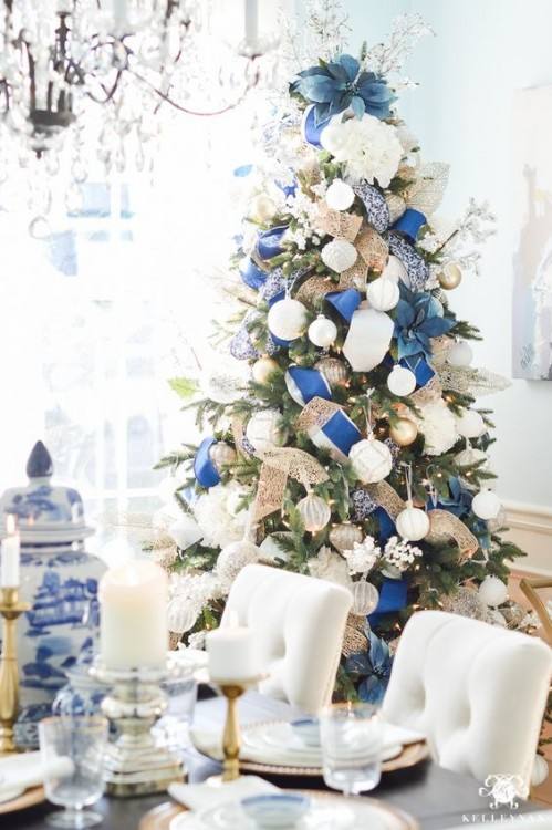 blue tree and white christmas decorations party ideas