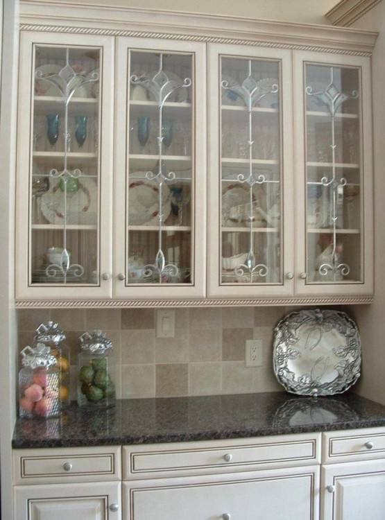 You can also choose the patterned glass cabinet doors to decorate your  classic kitchen cabinets