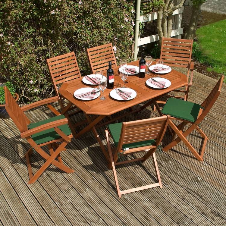 To get started on giving my outdoor dining furniture a complete makeover, I  gave everything a good cleaning and then used an electric sander to remove  the