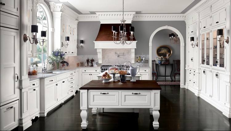 While few homeowners opt for the old opulent white kitchen all the way through, choosing white custom cabinets can offer you a very attractive, clean,