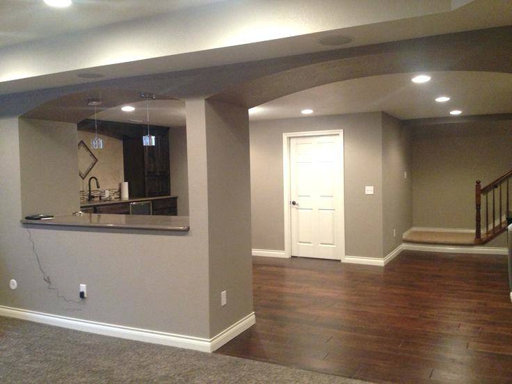 Transitional Gray Dining Room With White Accents