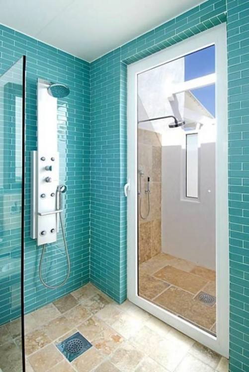 When creating an outdoor shower environment, Coastal Living