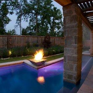 Custom outdoor zero infinity edge swimming pool designs with waterfalls and fiber optic lighting NJ