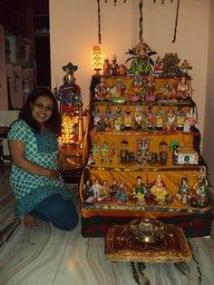Wooden planks  are set up and dolls mostly depicting gods and goddesses (see pic) are  displayed