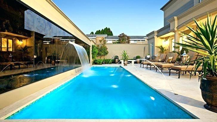 Consider inground pool designs for small yards that incorporate the pool  into your deck