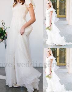 2017 Beach Bohemian Wedding Dresses Illusion Neckline Capped Sleeves Empire Backless White Lace And Chiffon Flowy Sexy Cheap Bridal Gowns Wedding Dresses