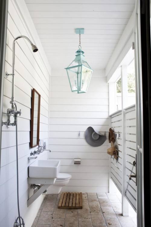 This little outbuilding makes a great shower house and a great design element