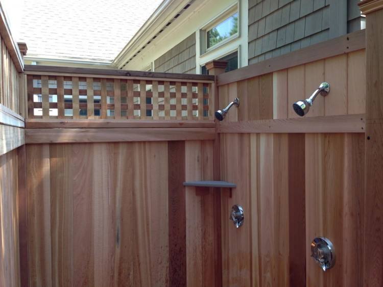 This beach house went with a surf theme for their outdoor shower